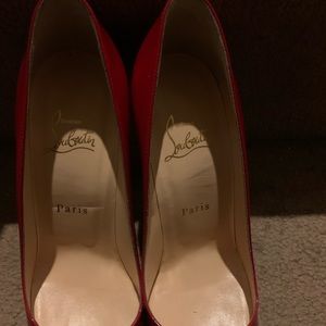 Red Christian Louboutins